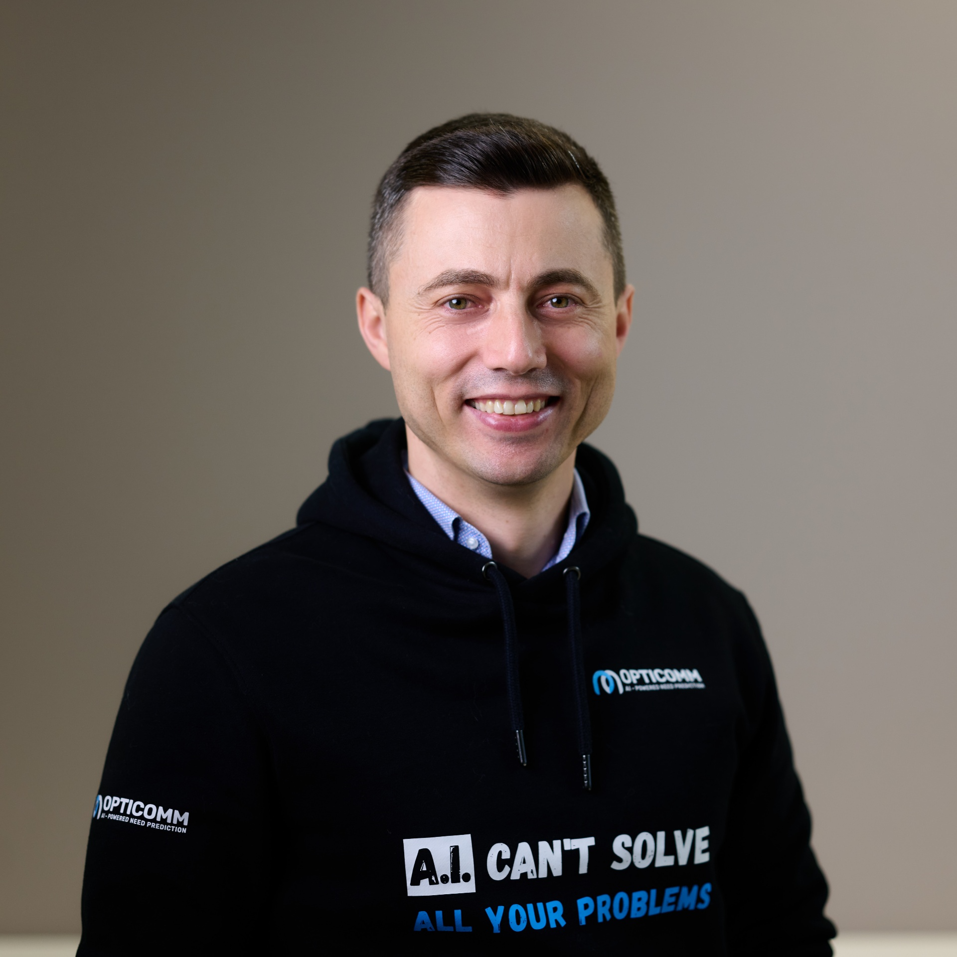 Cristi Movila, Founder and CEO of OptiComm.AI